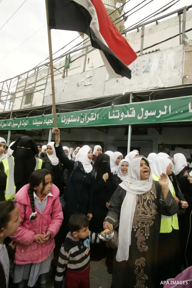 Palestinian students participate in a rally celebrating the resignation of Egyptian President Hosni Mubarak, in southern Gaza Strip town of Rafah on Feb. 12, 2011. Photo by Abed Rahim Khatib