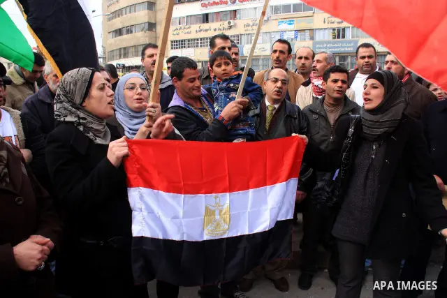 Palestinians celebrate Egyptian President Hosni Mubarak's resignation, in the West Bank city of Nablus, Saturday, Feb. 12 , 2011. Photo by Wagdi Eshtayah