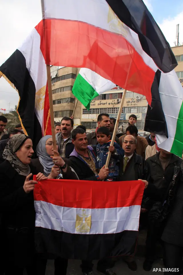 Palestinians celebrate Egyptian President Hosni Mubarak's resignation, in the West Bank city of Nablus, Saturday, Feb. 12 , 2011. Photo by Wagdi Eshtayah