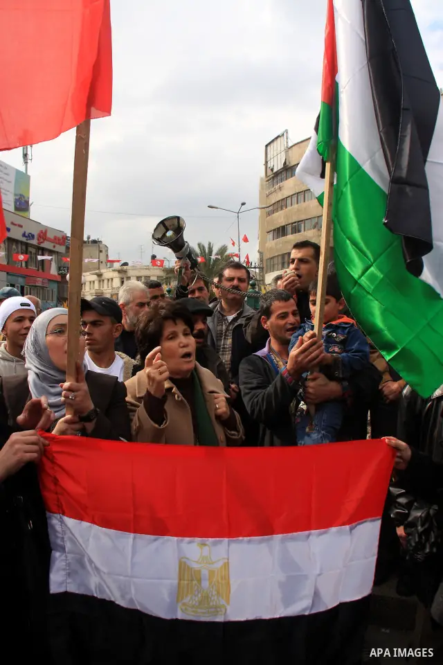 Palestinians celebrate Egyptian President Hosni Mubarak's resignation, in the West Bank city of Nablus, Saturday, Feb. 12 , 2011. Photo by Wagdi Eshtayah
