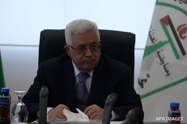 Palestinian President Mahmoud Abbas attends a Palestinian Liberation Organization (PLO) executive committee meeting in the West Bank city of Ramallah, Saturday, Feb. 12, 2011. Photo by Issam Rimawi