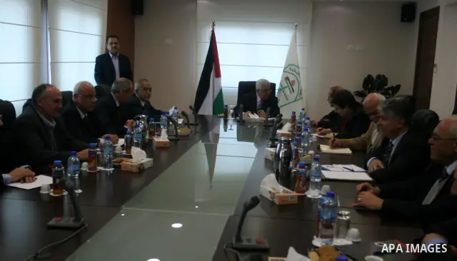 Palestinian President Mahmoud Abbas attends a Palestinian Liberation Organization (PLO) executive committee meeting in the West Bank city of Ramallah, Saturday, Feb. 12, 2011. Photo by Issam Rimawi