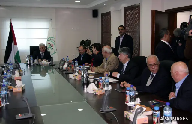 Palestinian President Mahmoud Abbas attends a Palestinian Liberation Organization (PLO) executive committee meeting in the West Bank city of Ramallah, Saturday, Feb. 12, 2011. Photo by Thaer Ganaim