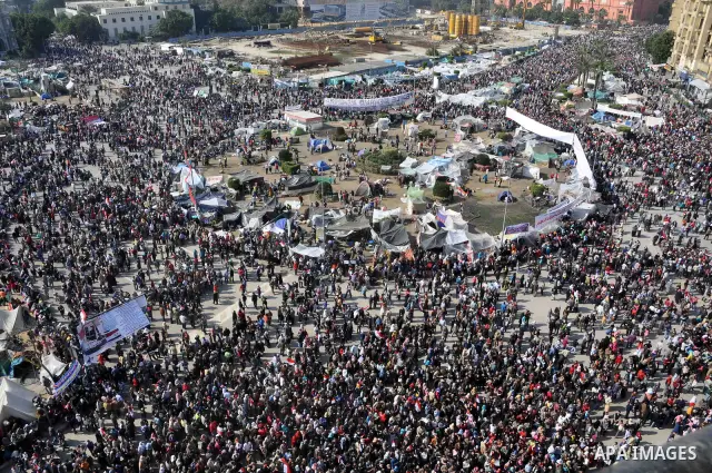 Egyptians celebrate and wave national flags in Tahrir Square in Cairo, Egypt, Saturday, Feb. 12, 2011. Egypt exploded with joy, tears, and relief after pro-democracy protesters brought down President Hosni Mubarak with a...
