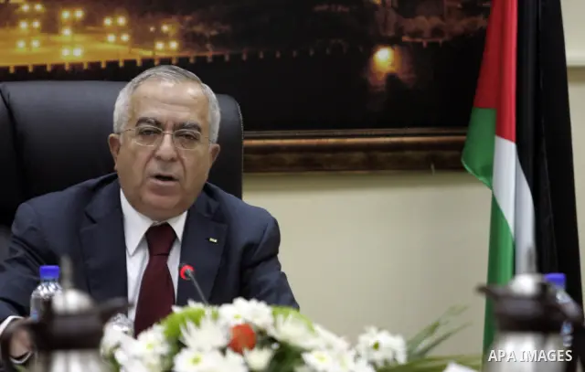 Palestinian Prime Minister Salam Fayyad heads the Palestinian cabinet meeting in the West Bank city of Ramallah on Feb. 14,2011. Photo by Mustafa Abu Dayeh