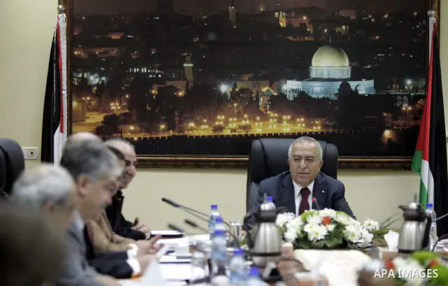 Palestinian Prime Minister Salam Fayyad heads the Palestinian cabinet meeting in the West Bank city of Ramallah on Feb. 14,2011. Photo by Mustafa Abu Dayeh