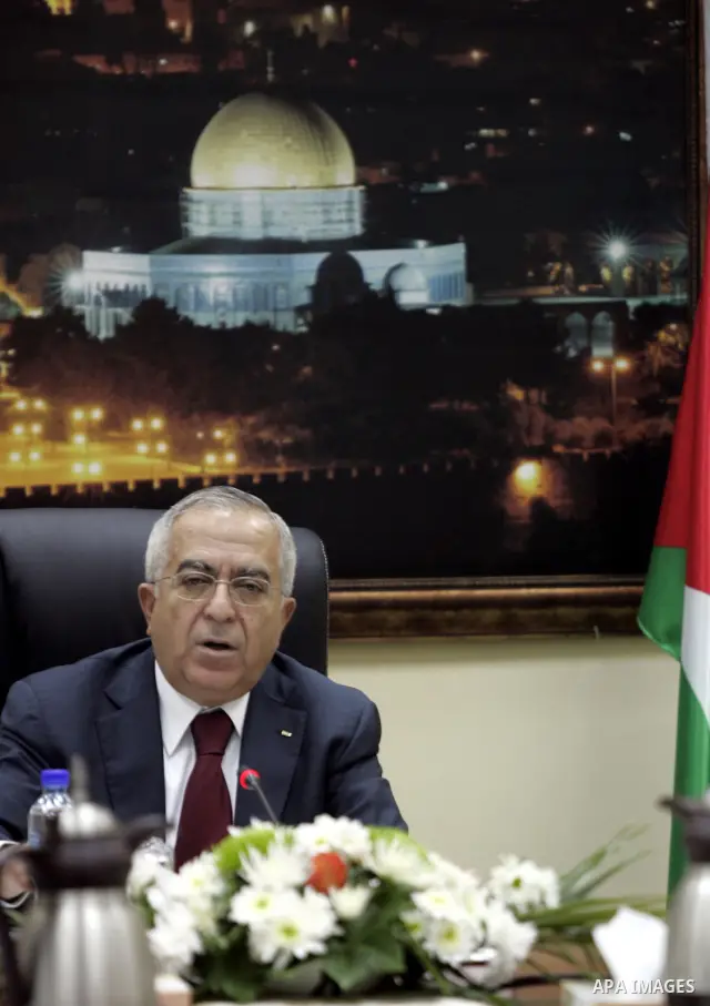 Palestinian Prime Minister Salam Fayyad heads the Palestinian cabinet meeting in the West Bank city of Ramallah on Feb. 14,2011. Photo by Mustafa Abu Dayeh