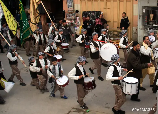 Palestinian Muslims celebrate the anniversary of the Prophet Muhammad birth in the West Bank city of Nablus, Tuesday, Feb. 15, 2011. Photo by Wagdi Eshtayah