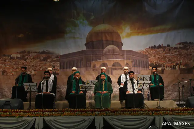 Palestinian youths sing Islamic songs during a ceremony commemorating the birth of Prophet Muhammad, known in Arabic as Mawlid al-Nabawi, at the Shawwa Theatre in Gaza City on Feb. 15, 2011. Photo by Ashraf Amra