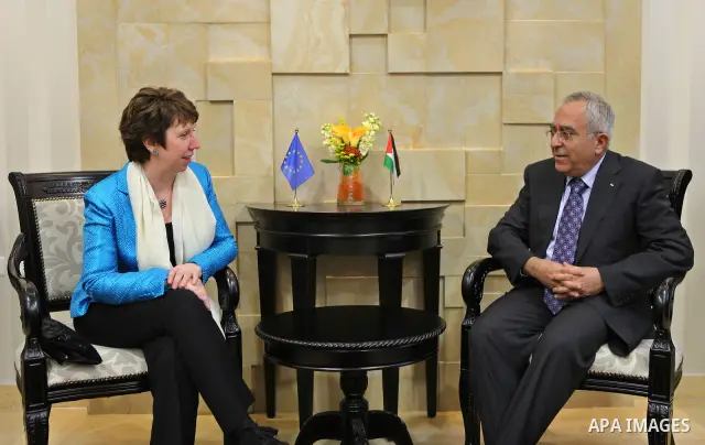 Palestinian Prime Minister Salam Fayyad (R) meets with Catherine Ashton (L), High Representative for Foreign Affairs and Security Policy of the European Union, in the West Bank city of Ramallah, on Feb. 15, 2011. Photo b...