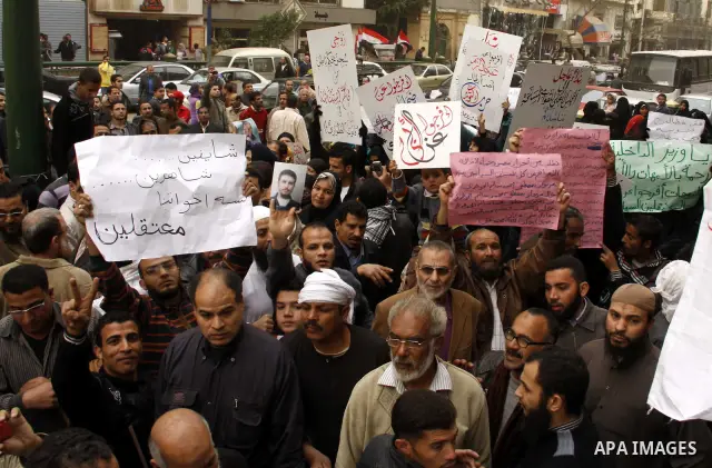 Egyptians take part in a rally calling for release of political prisoners in Cairo, Egypt, Wednesday, Feb. 16, 2011. Photo by Ahmed Asad
