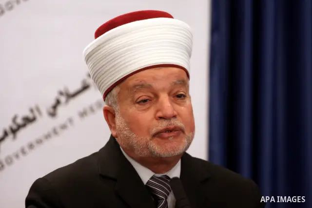 Mohammed Hussein, the mufti of Jerusalem and Palestine attends a joint news conference in Ramallah in the West Bank, February 16, 2011. Photo by Issam Rimawi