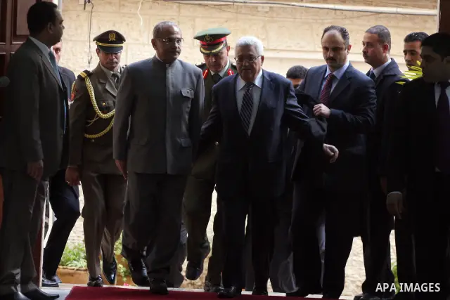 Palestinian president Mahmoud Abbas (L) meets with East Timor President, Jose Ramos-Horta (R) upon his arrival , in the West Bank city of Ramallah on February 17, 2011. Photo by Issam Rimawi