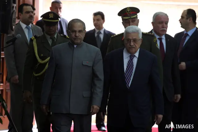 Palestinian President Mahmoud Abbas (R) and East Timor President, Jose Ramos-Horta (L) during the welcome ceremony, as Ramos-Horta arrive to the West Bank city of Ramallah on February 17, 2011. Photo by Issam Rimawi