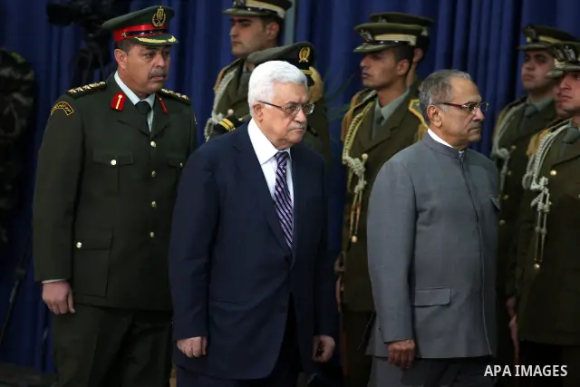 Palestinian President Mahmoud Abbas (L) and East Timor President, Jose Ramos-Horta (R) during the welcome ceremony, as Ramos-Horta arrive to the West Bank city of Ramallah on February 17, 2011. Photo by Issam Rimawi
