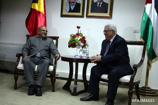 Palestinian president Mahmoud Abbas (L) meets with East Timor President, Jose Ramos-Horta (R) upon his arrival , in the West Bank city of Ramallah on February 17, 2011. Photo by Issam Rimawi