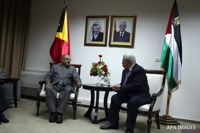 Palestinian president Mahmoud Abbas (L) meets with East Timor President, Jose Ramos-Horta (R) upon his arrival , in the West Bank city of Ramallah on February 17, 2011. Photo by Issam Rimawi