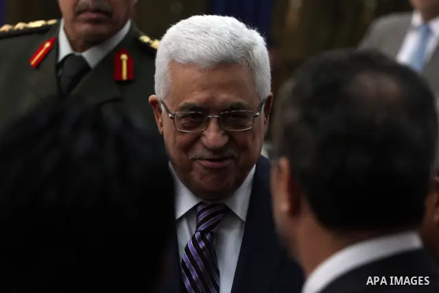 Palestinian President Mahmoud Abbas and East Timor President, Jose Ramos-Horta (note seen) during the welcome ceremony, as Ramos-Horta arrive to the West Bank city of Ramallah on February 17, 2011. Photo by Issam Rimawi