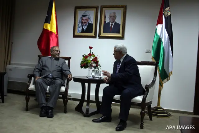 Palestinian president Mahmoud Abbas (L) meets with East Timor President, Jose Ramos-Horta (R) upon his arrival , in the West Bank city of Ramallah on February 17, 2011. Photo by Issam Rimawi