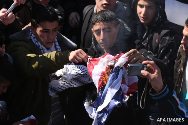 Palestinians take part in a rally calling for ending the Palestinian division, in the West Bank city of Ramallah on Feb. 17, 2011. More than 3000 protesters call for free elections and the reconciliation between the two...