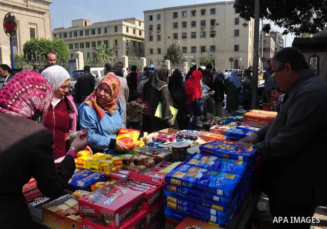 Egyptian people participate in their daily life in Cairo, Egypt on Feb. 17,2011. Mubarak's departure set off a chain reaction around the Middle East, with anti-government demonstrations reported Wednesday in Libya, Bahra...
