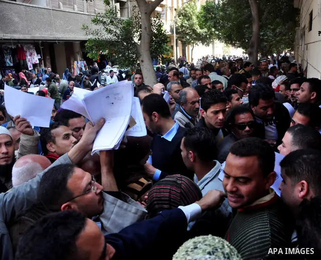 Egyptian people participate in their daily life in Cairo, Egypt on Feb. 17,2011. Mubarak's departure set off a chain reaction around the Middle East, with anti-government demonstrations reported Wednesday in Libya, Bahra...