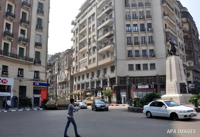 Egyptian people participate in their daily life in Cairo, Egypt on Feb. 17,2011. Mubarak's departure set off a chain reaction around the Middle East, with anti-government demonstrations reported Wednesday in Libya, Bahra...