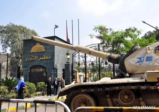 Egyptian people participate in their daily life in Cairo, Egypt on Feb. 17,2011. Mubarak's departure set off a chain reaction around the Middle East, with anti-government demonstrations reported Wednesday in Libya, Bahra...