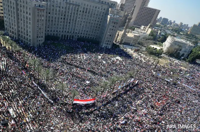 Thousands attend Friday prayers and a demonstration in Tahrir Square in Cairo, Egypt, Friday Feb. 18, 2011. Tens of thousands of flag-waving Egyptians packed into Tahrir Square for a day of prayer and celebration Friday...