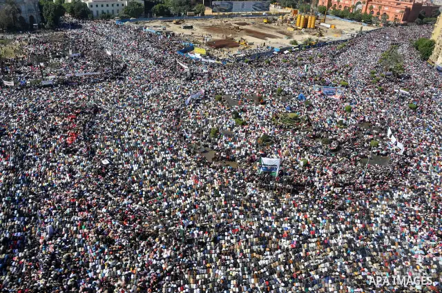 Thousands attend Friday prayers and a demonstration in Tahrir Square in Cairo, Egypt, Friday Feb. 18, 2011. Tens of thousands of flag-waving Egyptians packed into Tahrir Square for a day of prayer and celebration Friday...