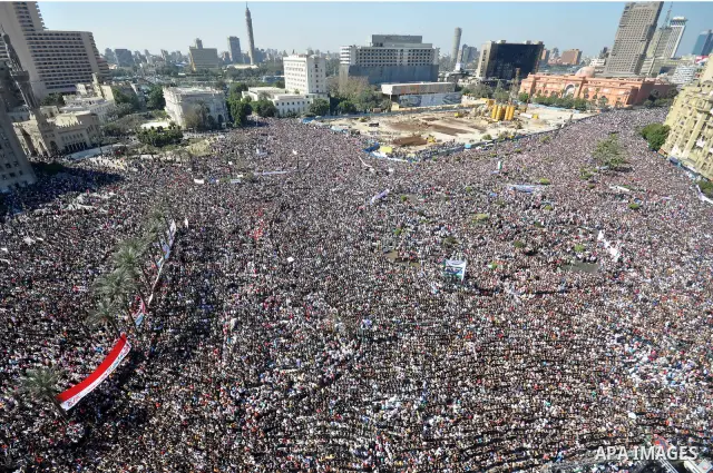 Thousands attend Friday prayers and a demonstration in Tahrir Square in Cairo, Egypt, Friday Feb. 18, 2011. Tens of thousands of flag-waving Egyptians packed into Tahrir Square for a day of prayer and celebration Friday...