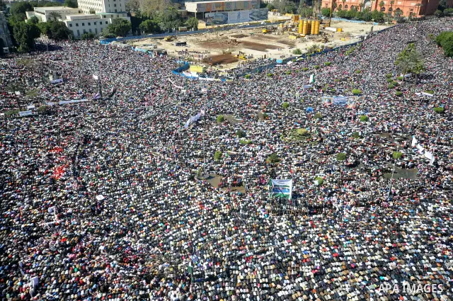 Thousands attend Friday prayers and a demonstration in Tahrir Square in Cairo, Egypt, Friday Feb. 18, 2011. Tens of thousands of flag-waving Egyptians packed into Tahrir Square for a day of prayer and celebration Friday...