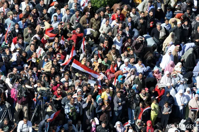 Thousands attend Friday prayers and a demonstration in Tahrir Square in Cairo, Egypt, Friday Feb. 18, 2011. Tens of thousands of flag-waving Egyptians packed into Tahrir Square for a day of prayer and celebration Friday...
