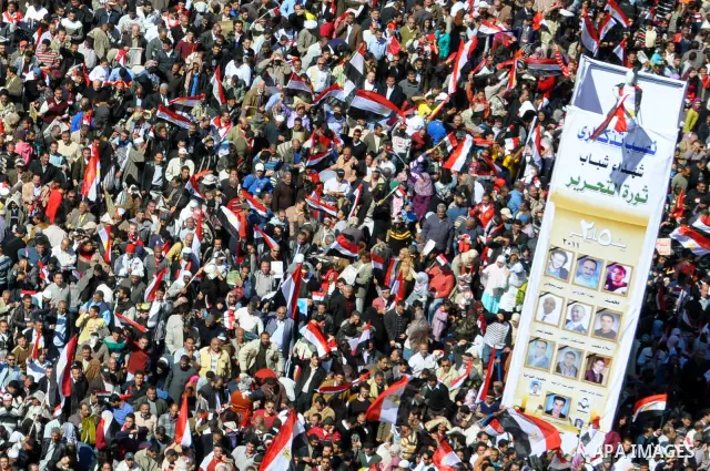 Thousands attend Friday prayers and a demonstration in Tahrir Square in Cairo, Egypt, Friday Feb. 18, 2011. Tens of thousands of flag-waving Egyptians packed into Tahrir Square for a day of prayer and celebration Friday...