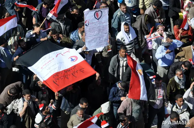 Thousands attend Friday prayers and a demonstration in Tahrir Square in Cairo, Egypt, Friday Feb. 18, 2011. Tens of thousands of flag-waving Egyptians packed into Tahrir Square for a day of prayer and celebration Friday...