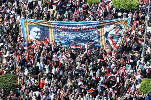 Thousands attend Friday prayers and a demonstration in Tahrir Square in Cairo, Egypt, Friday Feb. 18, 2011. Tens of thousands of flag-waving Egyptians packed into Tahrir Square for a day of prayer and celebration Friday...