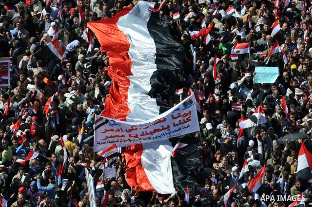 Thousands attend Friday prayers and a demonstration in Tahrir Square in Cairo, Egypt, Friday Feb. 18, 2011. Tens of thousands of flag-waving Egyptians packed into Tahrir Square for a day of prayer and celebration Friday...