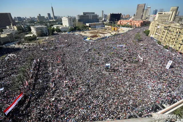 Thousands attend Friday prayers and a demonstration in Tahrir Square in Cairo, Egypt, Friday Feb. 18, 2011. Tens of thousands of flag-waving Egyptians packed into Tahrir Square for a day of prayer and celebration Friday...