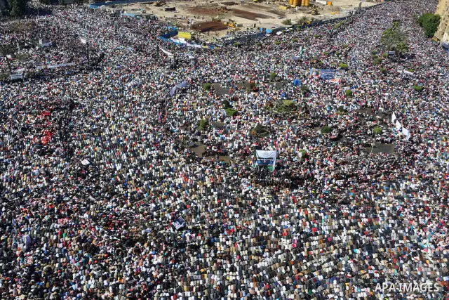 Thousands attend Friday prayers and a demonstration in Tahrir Square in Cairo, Egypt, Friday Feb. 18, 2011. Tens of thousands of flag-waving Egyptians packed into Tahrir Square for a day of prayer and celebration Friday...