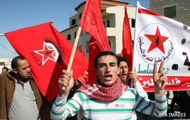 Palestinian, Israeli and International protesters take part in a demonstration against Israel's controversial separation barrier in the West Bank village of Maasarah, near the biblical town of Bethlehem on 18 February 20...