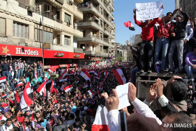 Thousands attend Friday prayers and a demonstration in Tahrir Square in Cairo, Egypt, Friday Feb. 18, 2011. Tens of thousands of flag-waving Egyptians packed into Tahrir Square for a day of prayer and celebration Friday...