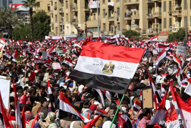 Thousands attend Friday prayers and a demonstration in Tahrir Square in Cairo, Egypt, Friday Feb. 18, 2011. Tens of thousands of flag-waving Egyptians packed into Tahrir Square for a day of prayer and celebration Friday...