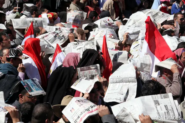 Thousands attend Friday prayers and a demonstration in Tahrir Square in Cairo, Egypt, Friday Feb. 18, 2011. Tens of thousands of flag-waving Egyptians packed into Tahrir Square for a day of prayer and celebration Friday...