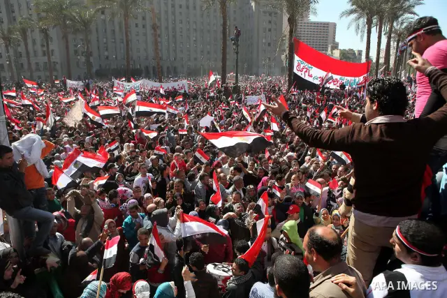 Thousands attend Friday prayers and a demonstration in Tahrir Square in Cairo, Egypt, Friday Feb. 18, 2011. Tens of thousands of flag-waving Egyptians packed into Tahrir Square for a day of prayer and celebration Friday...
