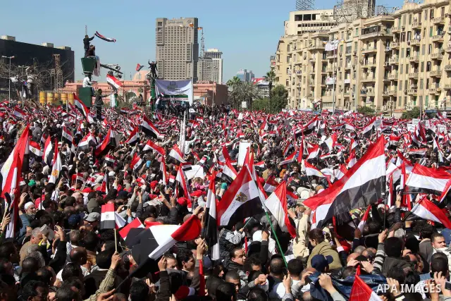 Thousands attend Friday prayers and a demonstration in Tahrir Square in Cairo, Egypt, Friday Feb. 18, 2011. Tens of thousands of flag-waving Egyptians packed into Tahrir Square for a day of prayer and celebration Friday...