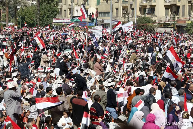 Thousands attend Friday prayers and a demonstration in Tahrir Square in Cairo, Egypt, Friday Feb. 18, 2011. Tens of thousands of flag-waving Egyptians packed into Tahrir Square for a day of prayer and celebration Friday...