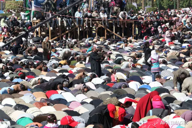 Thousands attend Friday prayers and a demonstration in Tahrir Square in Cairo, Egypt, Friday Feb. 18, 2011. Tens of thousands of flag-waving Egyptians packed into Tahrir Square for a day of prayer and celebration Friday...