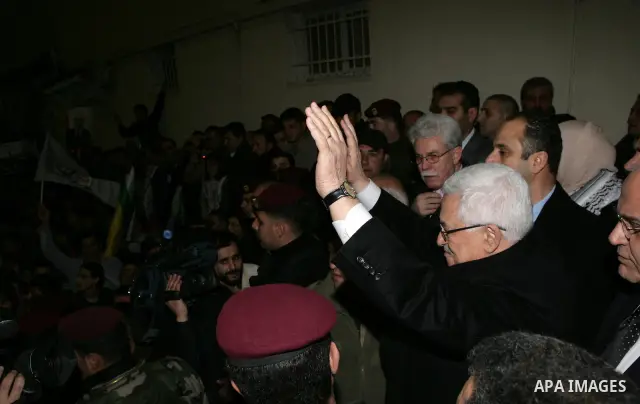 Palestinian President Mahmud Abbas during a march to show support and pro-security council decision against Israeli settlements, in the West Bank city of Ramallah on Feb. 18,2011. Photo by Thaer Ganaim