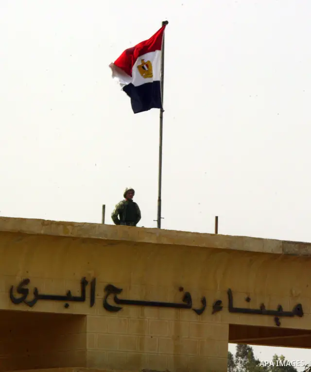Egyptian soldiers stand guard at the Rafah crossing on Feb. 19, 2011. The Egyptian authorities reopened the Rafah crossing on its border with the Gaza Stripe on Friday, the first time after the resignation of President H...