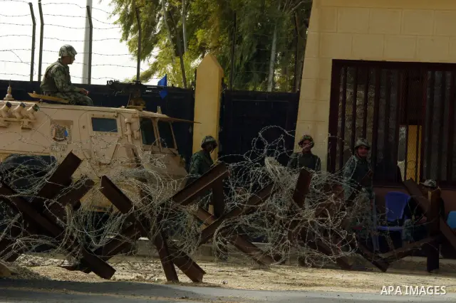 Egyptian soldiers stand guard at the Rafah crossing on Feb. 19, 2011. The Egyptian authorities reopened the Rafah crossing on its border with the Gaza Stripe on Friday, the first time after the resignation of President H...